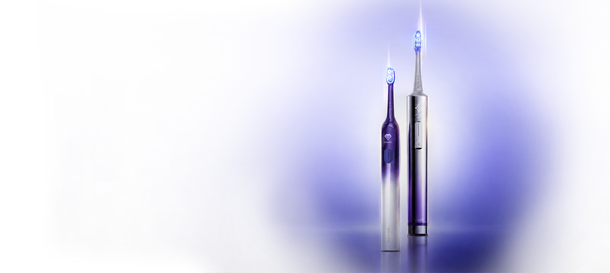 Glossonic toothbrushes on a blue light background