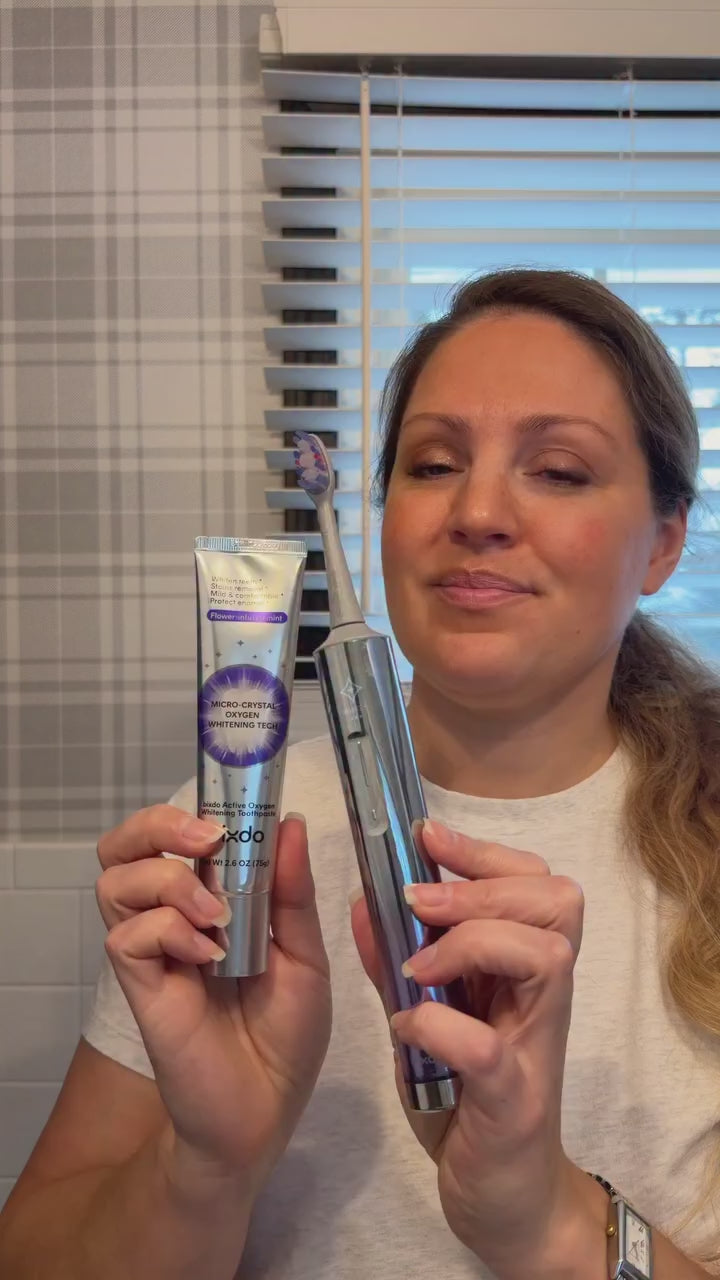 Creator holding a bixdo smile care product